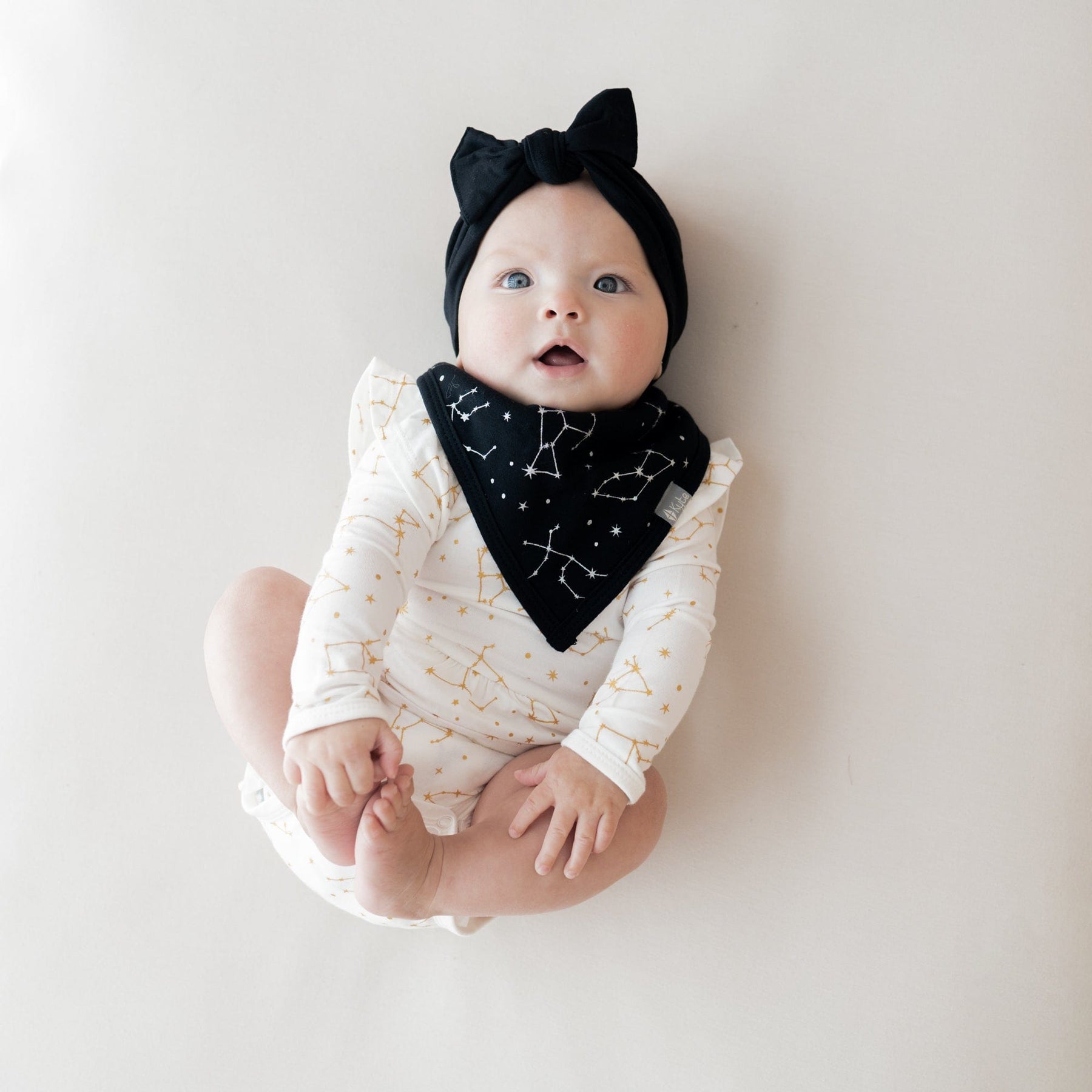 Kyte BABY Bib Midnight Constellations Bib in Midnight Constellations