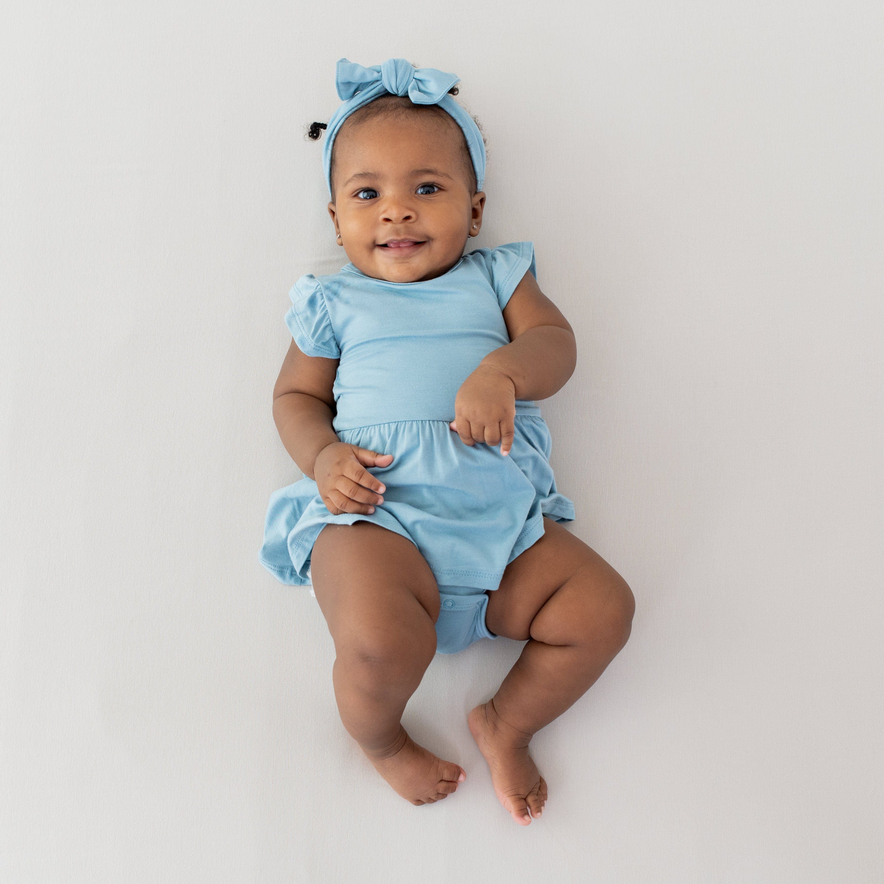 Kyte Baby Bodysuit Dress Twirl Bodysuit Dress in Dusty Blue