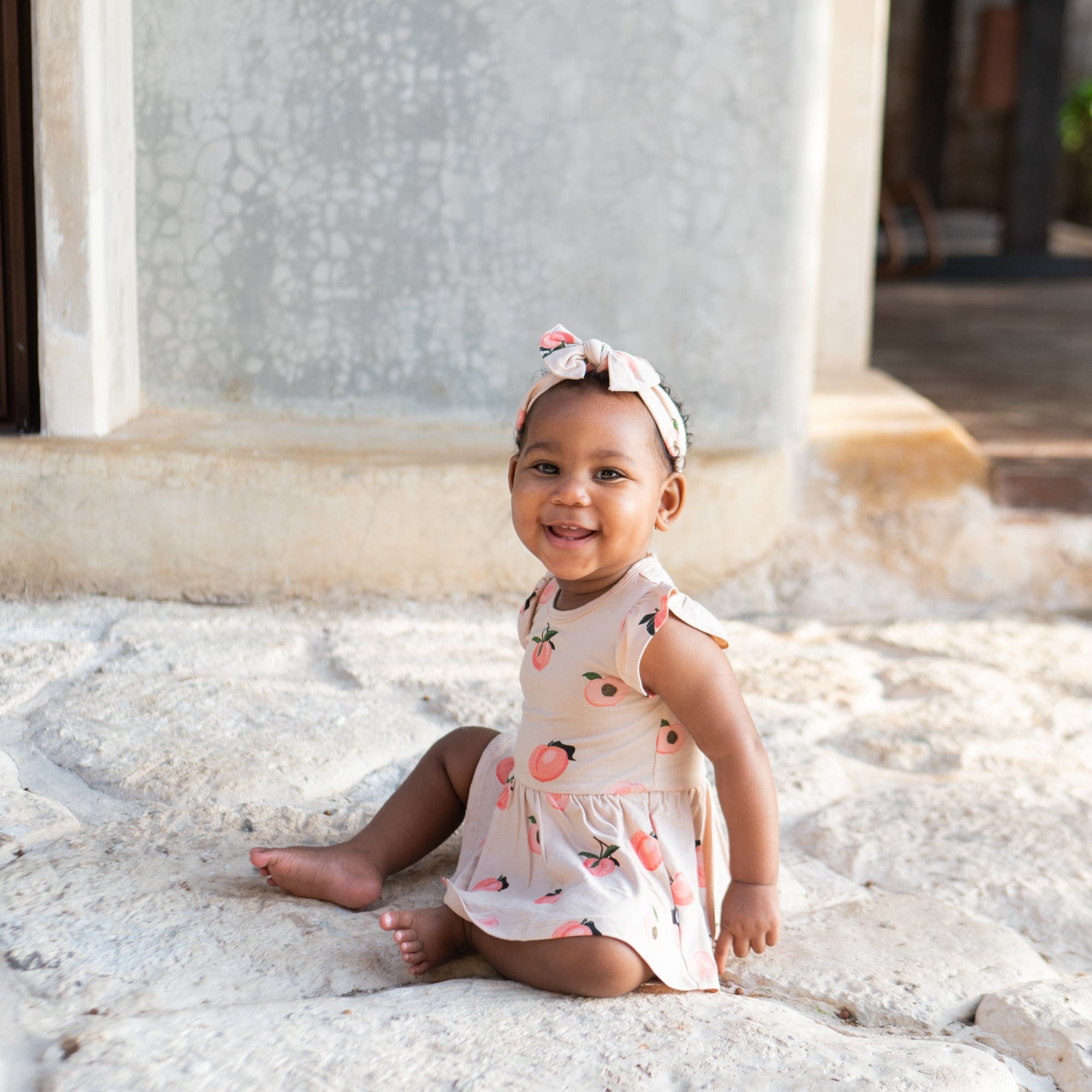 Kyte Baby Bodysuit Dress Twirl Bodysuit Dress in Peach