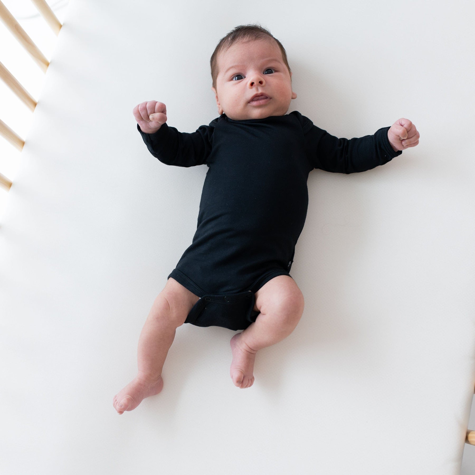 Kyte BABY Layette Long Sleeve Bodysuit in Midnight