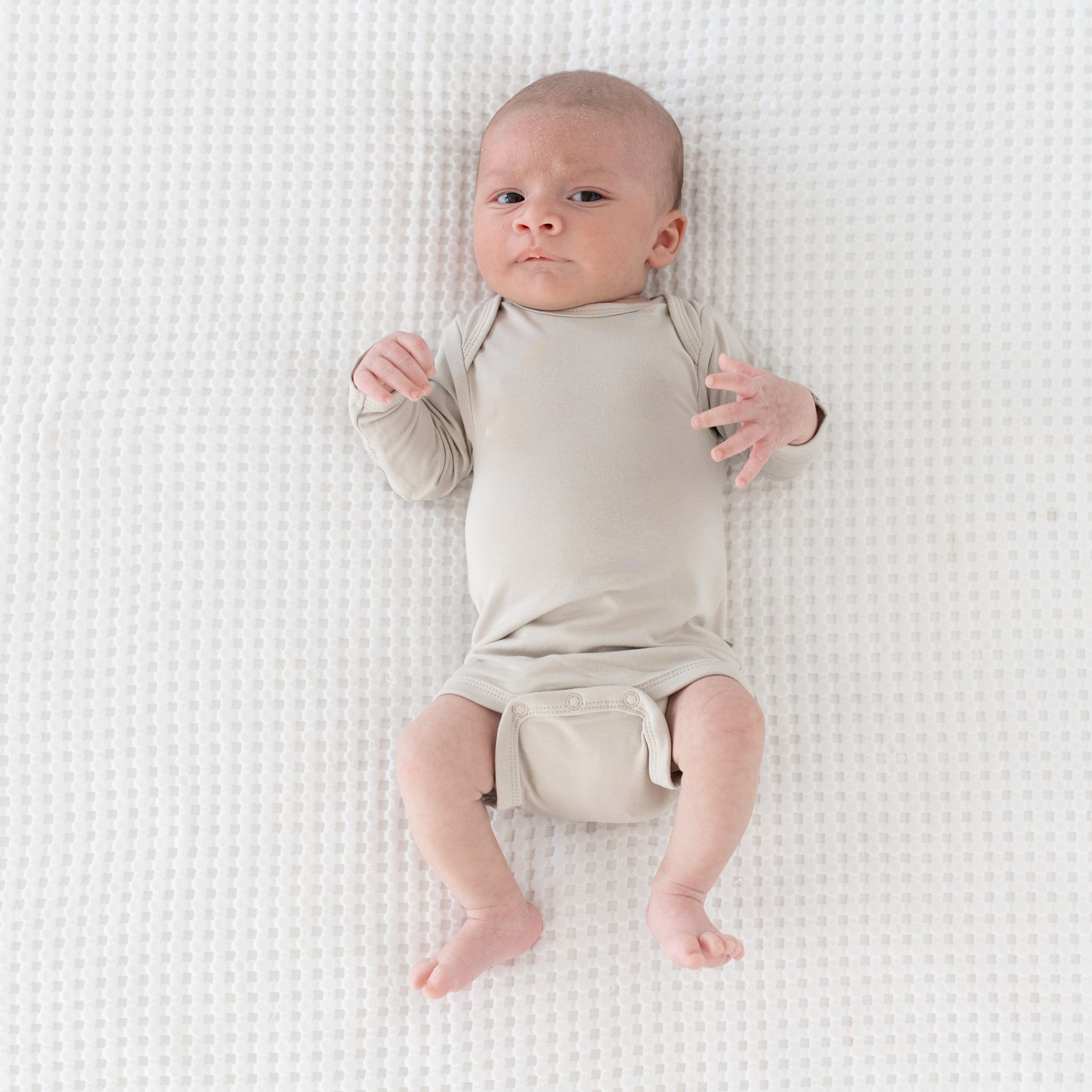 Kyte BABY Layette Long Sleeve Bodysuit in Oat