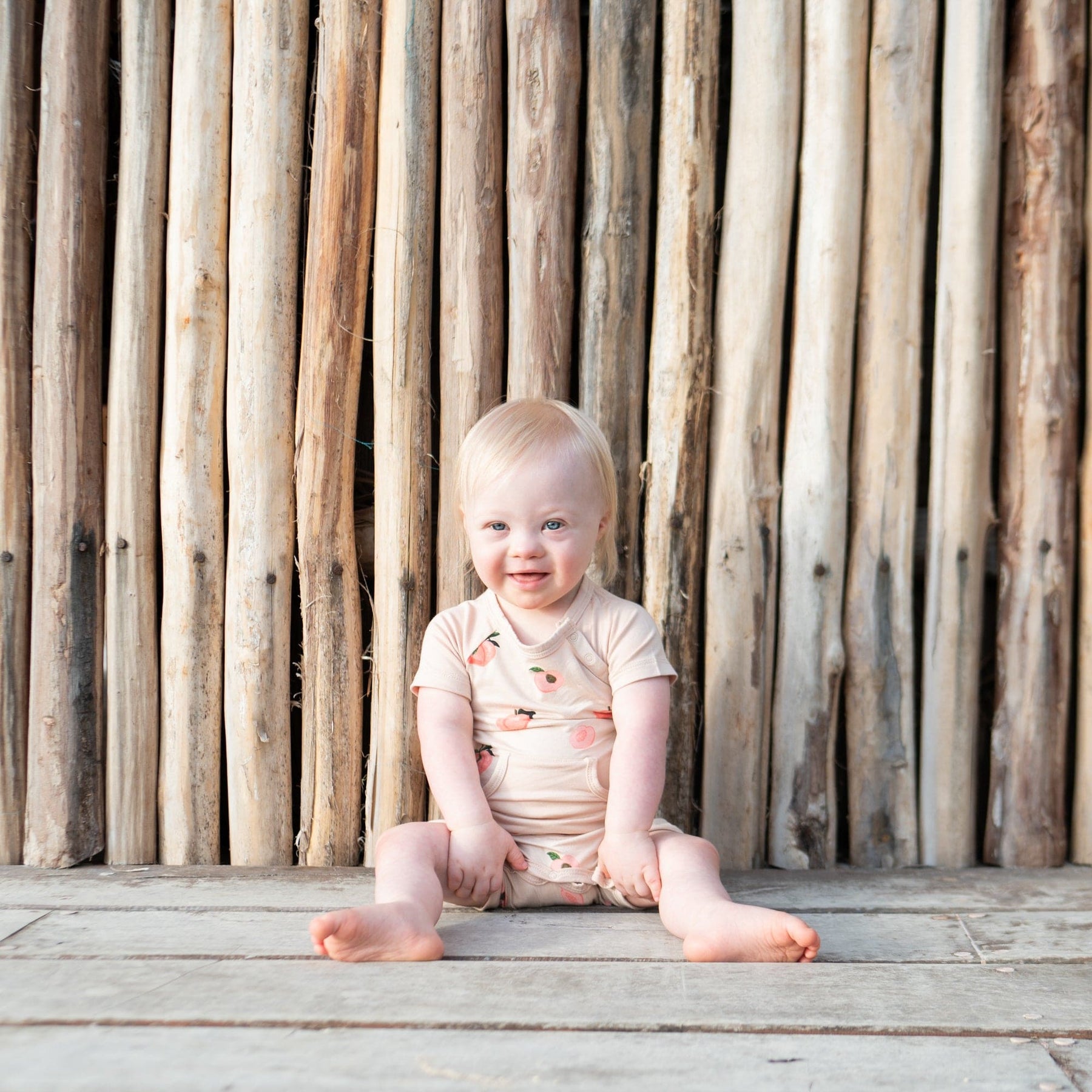 Kyte Baby Shortall Shortall in Peach