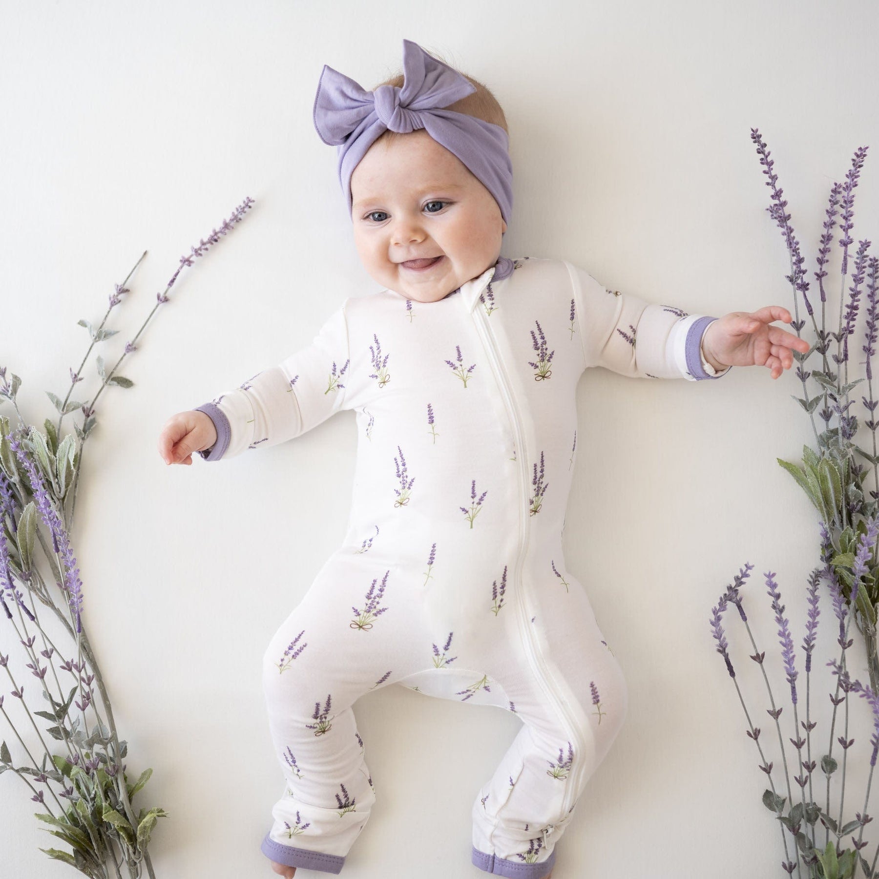 Kyte Baby Zippered Rompers Zippered Romper in Lavender