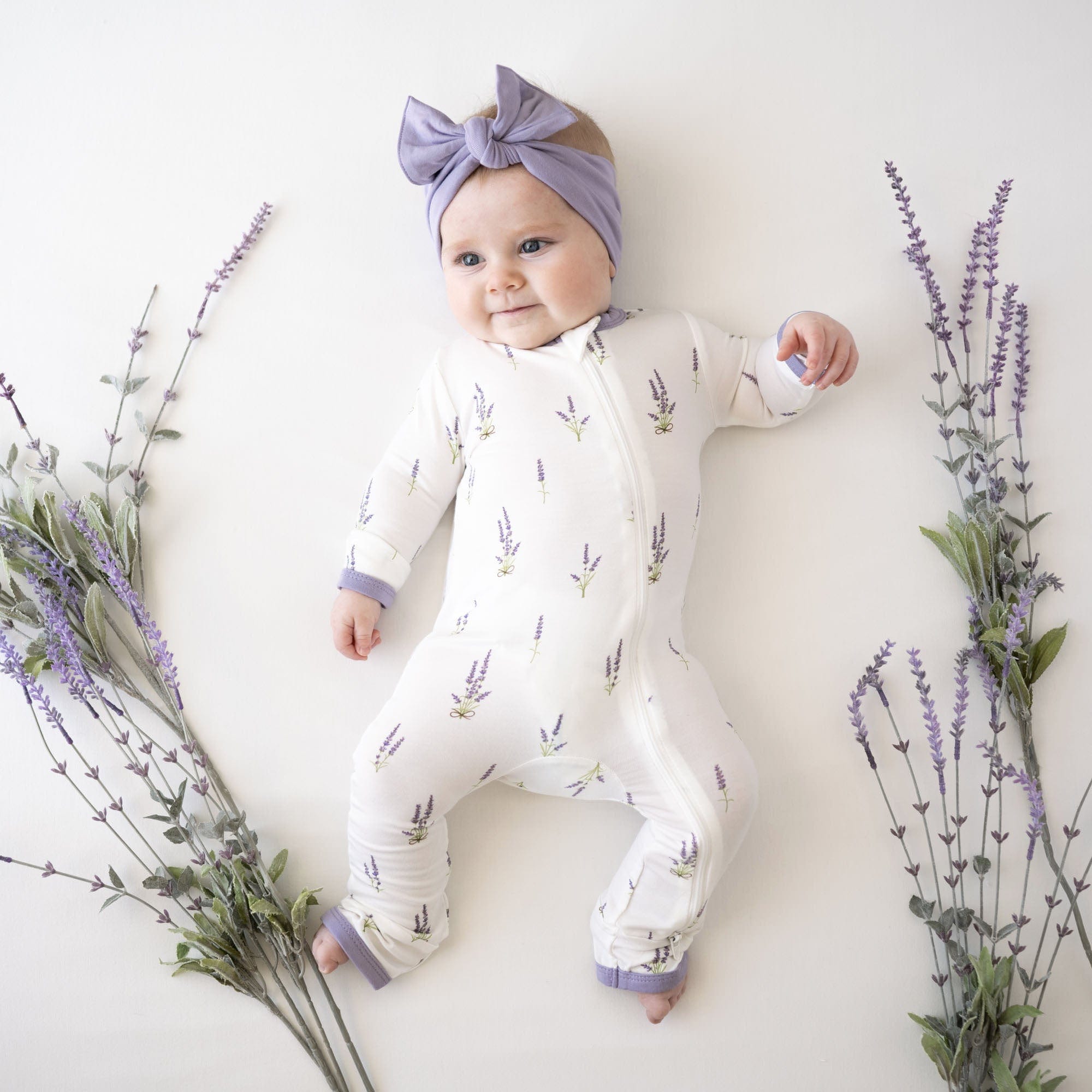 Kyte Baby Zippered Rompers Zippered Romper in Lavender